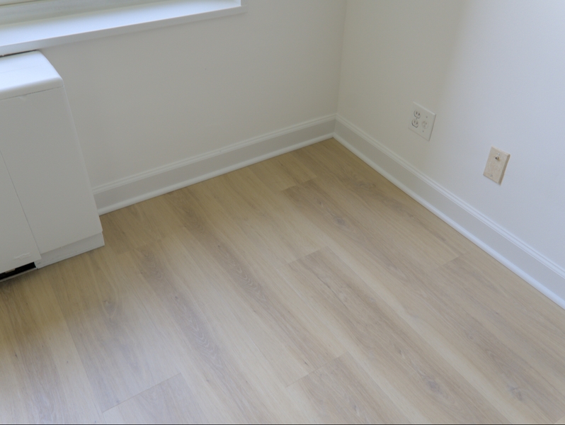 Light Oak Flooring with Crisp White Base Molding